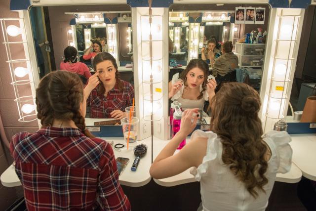 Student Actors Apply Makeup before a show in the Ely Black Box Theater