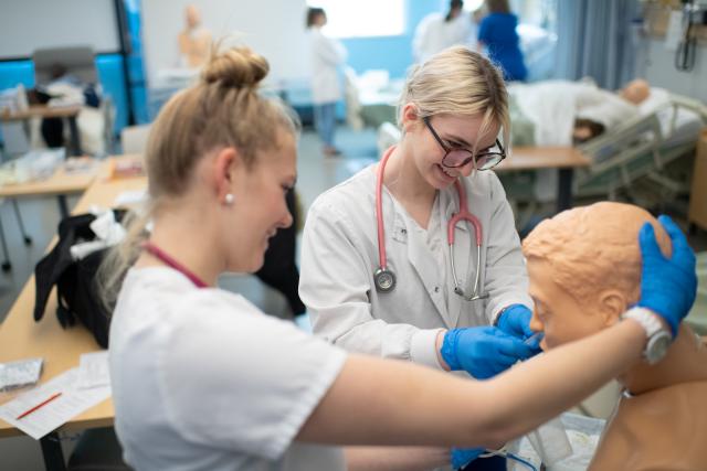 Westfield State nursing students work in the Sim Lab