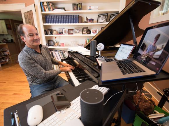 Professor Bonacci in his home studio working with a student over Zoom