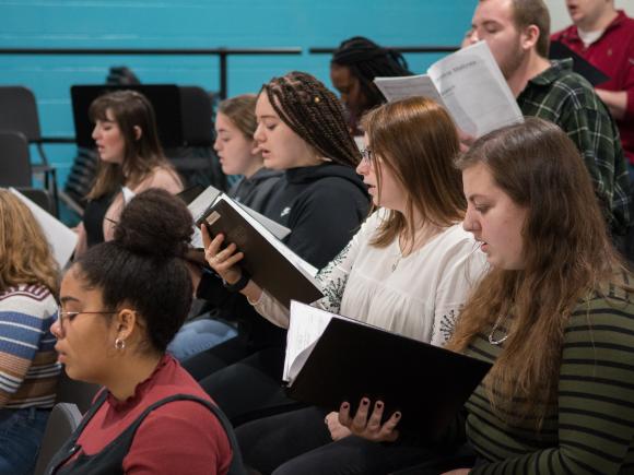 The WSU Chorale rehearses in the Dower Center for the Arts