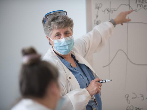 Nursing Faculty Joan Kuhnly lectures during class