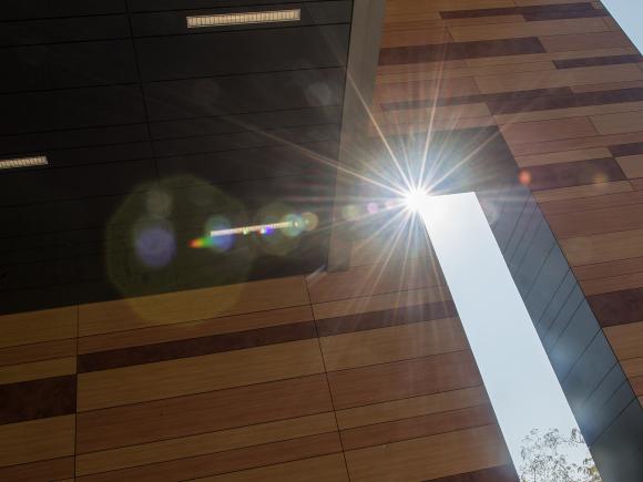 Sunlight shining through the architecture of University Hall