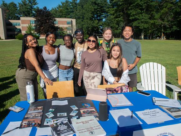 Asian and Pacific Islander Student Union Group Smiling on the Campus Green