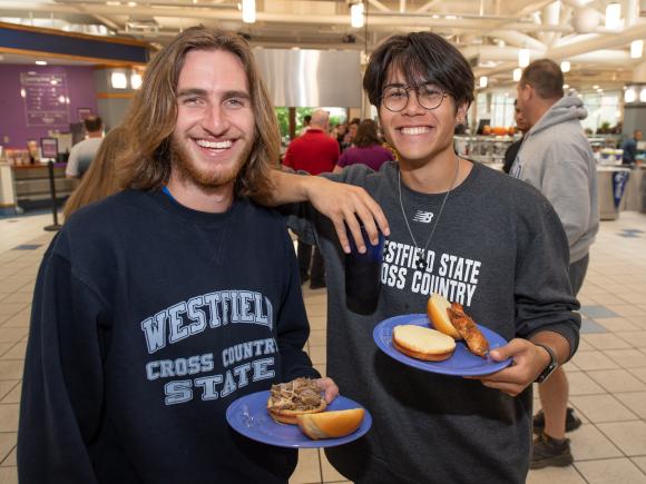 Two students eating together in the Dining Hall