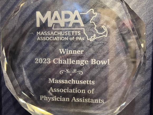 A trophy that says: MAPA, Massachusetts Association of Physician Assistants, Winner, 2023 Challenge Bowl