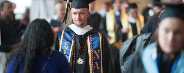 Image of student veteran at the beginning of commencement ceremonies
