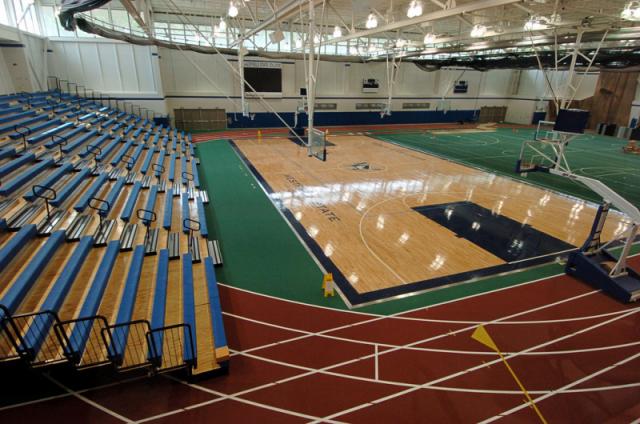 Image of the main basketball court in the Woodward Center, seen from the 2nd floor viewing area