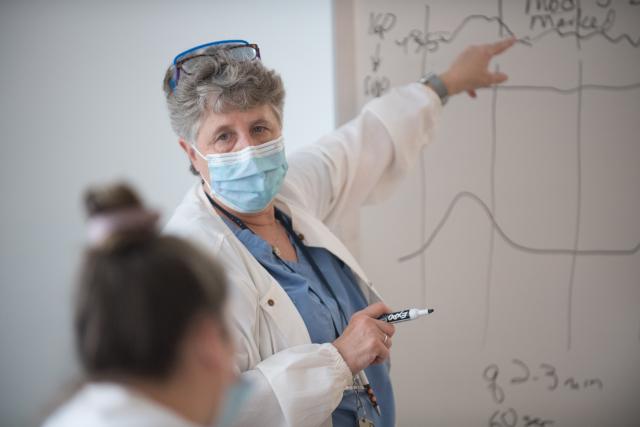 Nursing Faculty Joan Kuhnly lectures during class