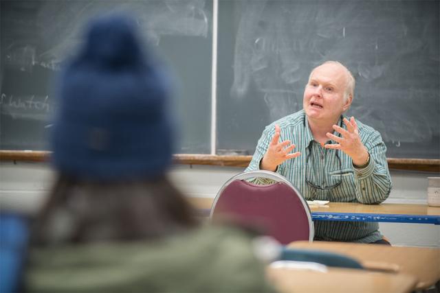 male professor lecturing class