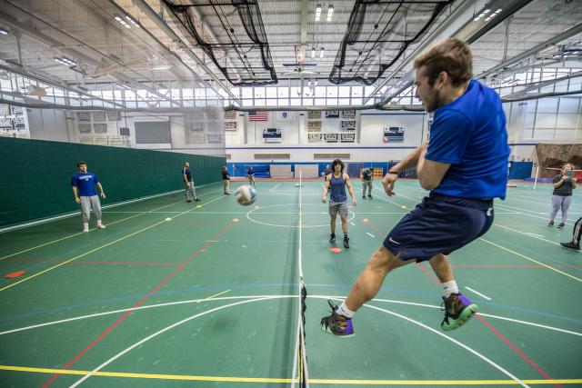 Students on the volleyball court