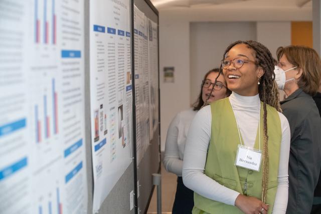 A Westfield State student explains her research at the semi-annual CURCA celebration
