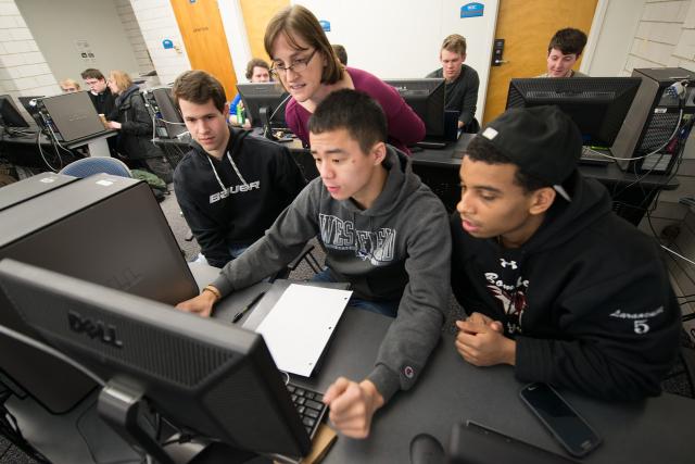 Westfield State professor with Computer Science students