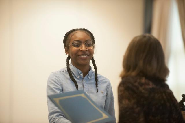 A Westfield State English student receives an award