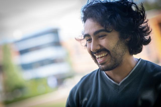 A Westfield State student in conversation