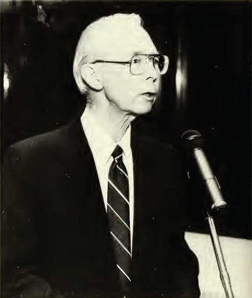John F. Nevin accepts the Outstanding Educator award in 1993.