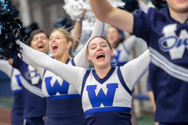 Westfield State Cheerleaders rally the crowd at a basketball game