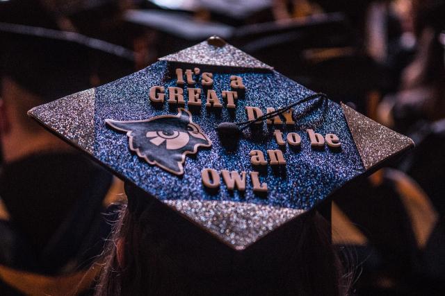 Graduation cap that says "It's a great day to be an owl"