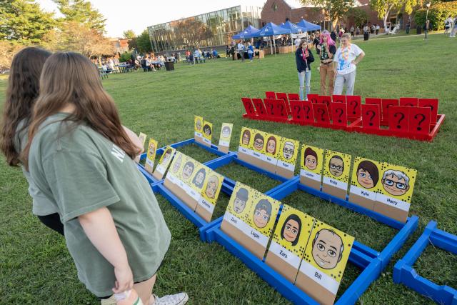 Students playing a game on the campus green during Welcome Week.