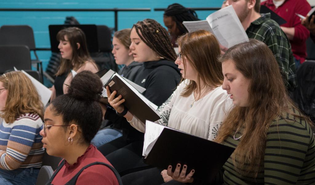 The WSU Chorale rehearses in the Dower Center for the Arts