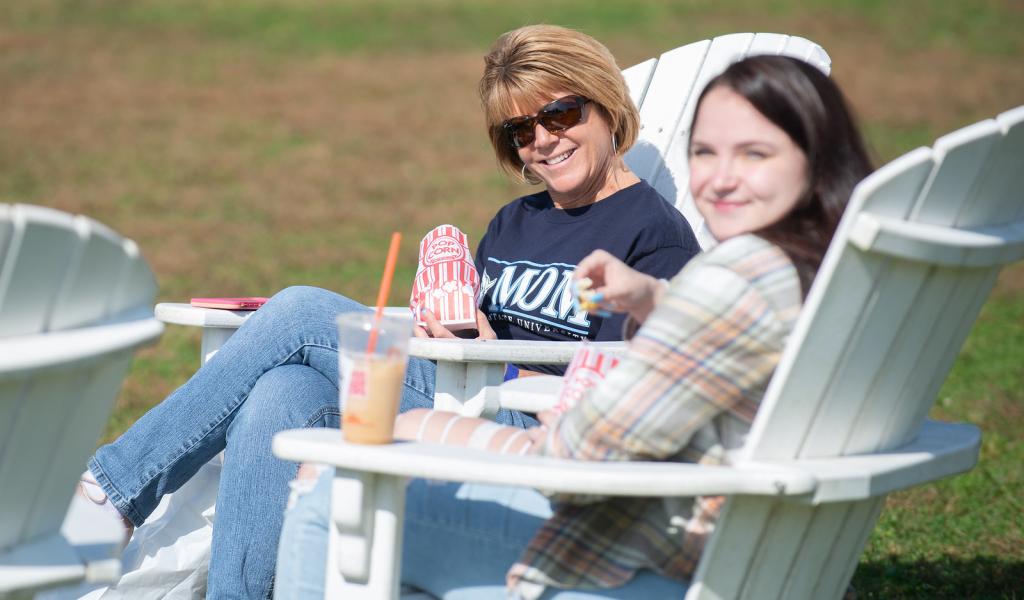 Student and their mom sitting