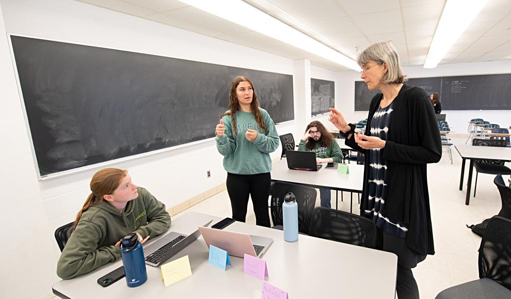 Students listen to Professor in classroom