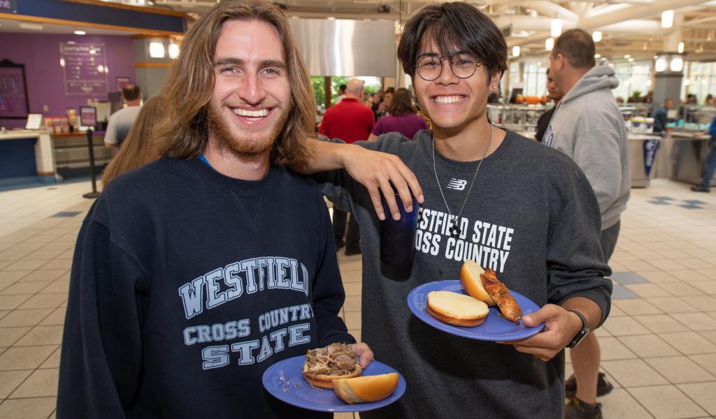 Two students eating together in the Dining Hall